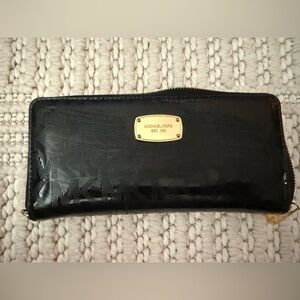 Michael Kors Glossy Black Wallet with Gold Accents